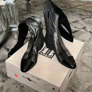 Black and silver kneel length boots